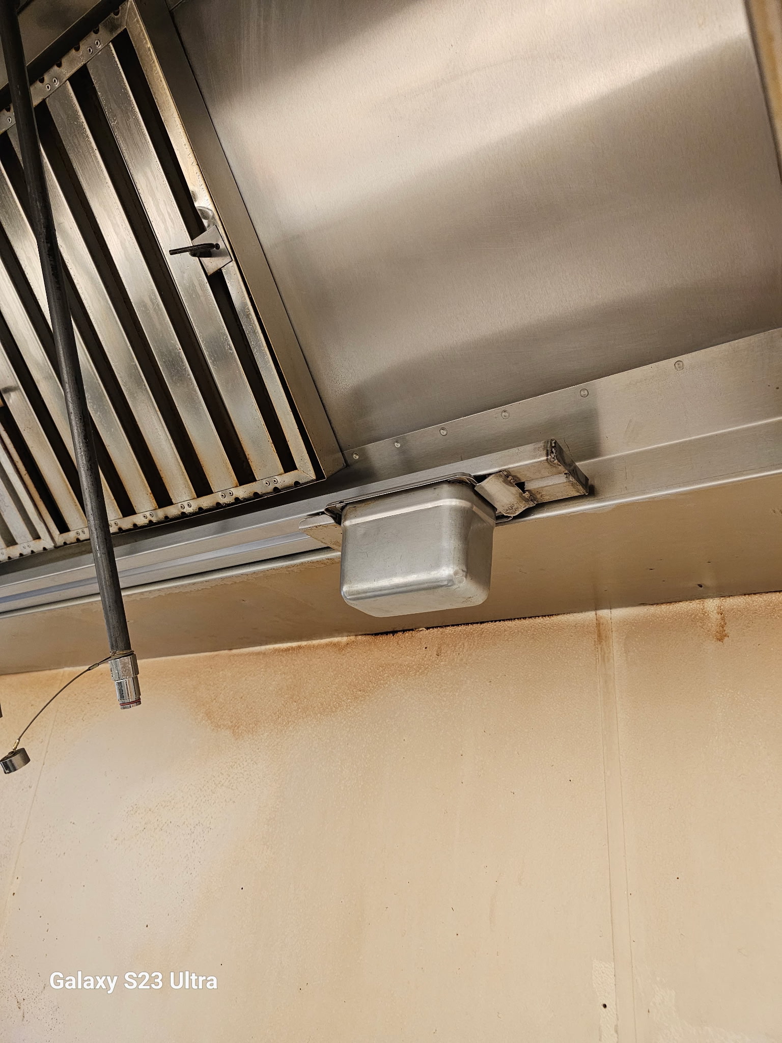 Commercial kitchen exhaust hood filters and grease collection cup