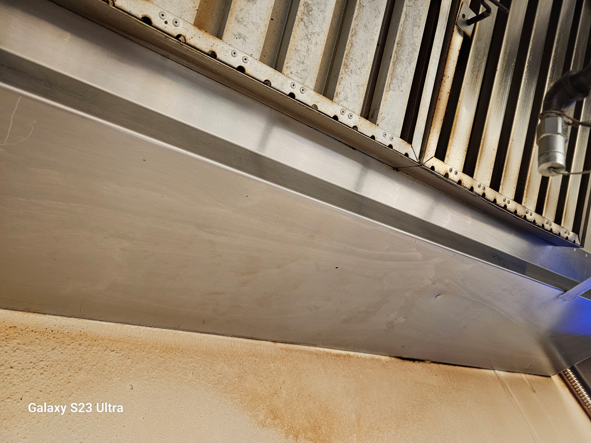 Underside of a commercial kitchen ventilation hood